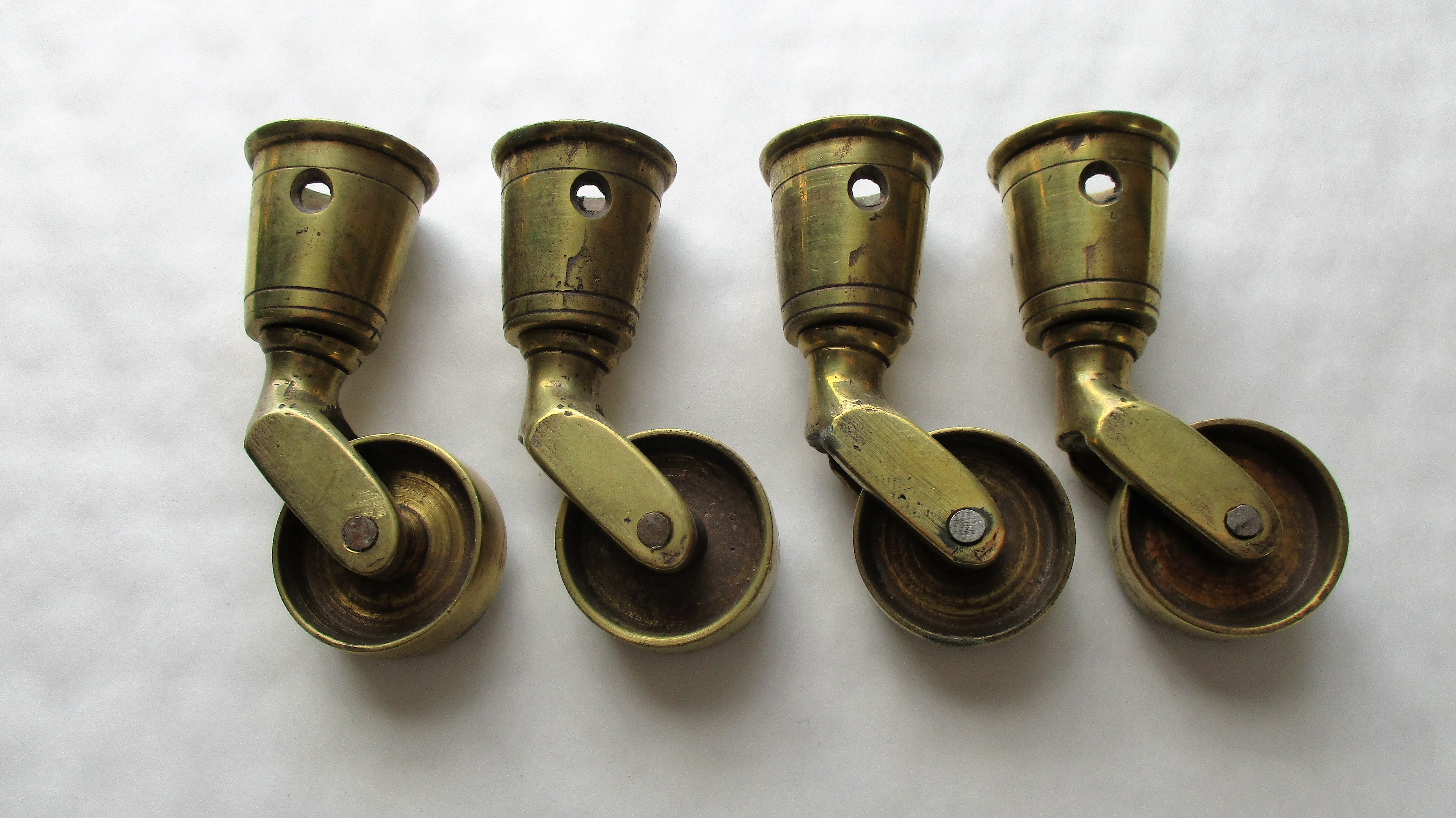 Solid brass round cup castors Rod Naylors Antique Restoration