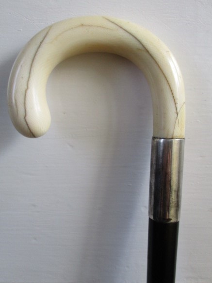 Ebony walking cane with carved ivory handle