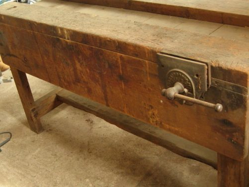 Antique industrial workbench with patina