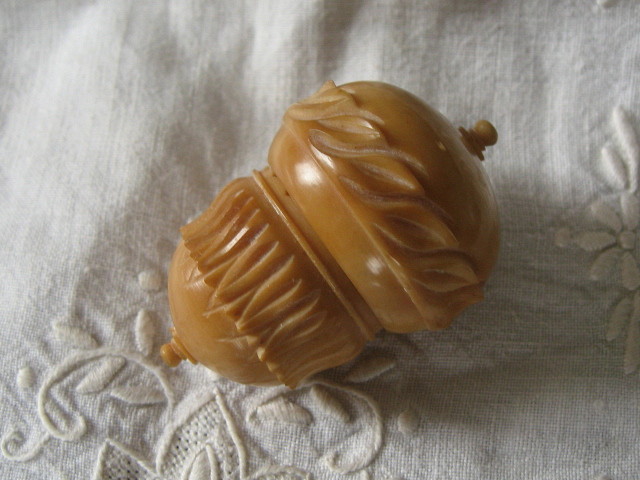 Antique tagua nut thimble holder