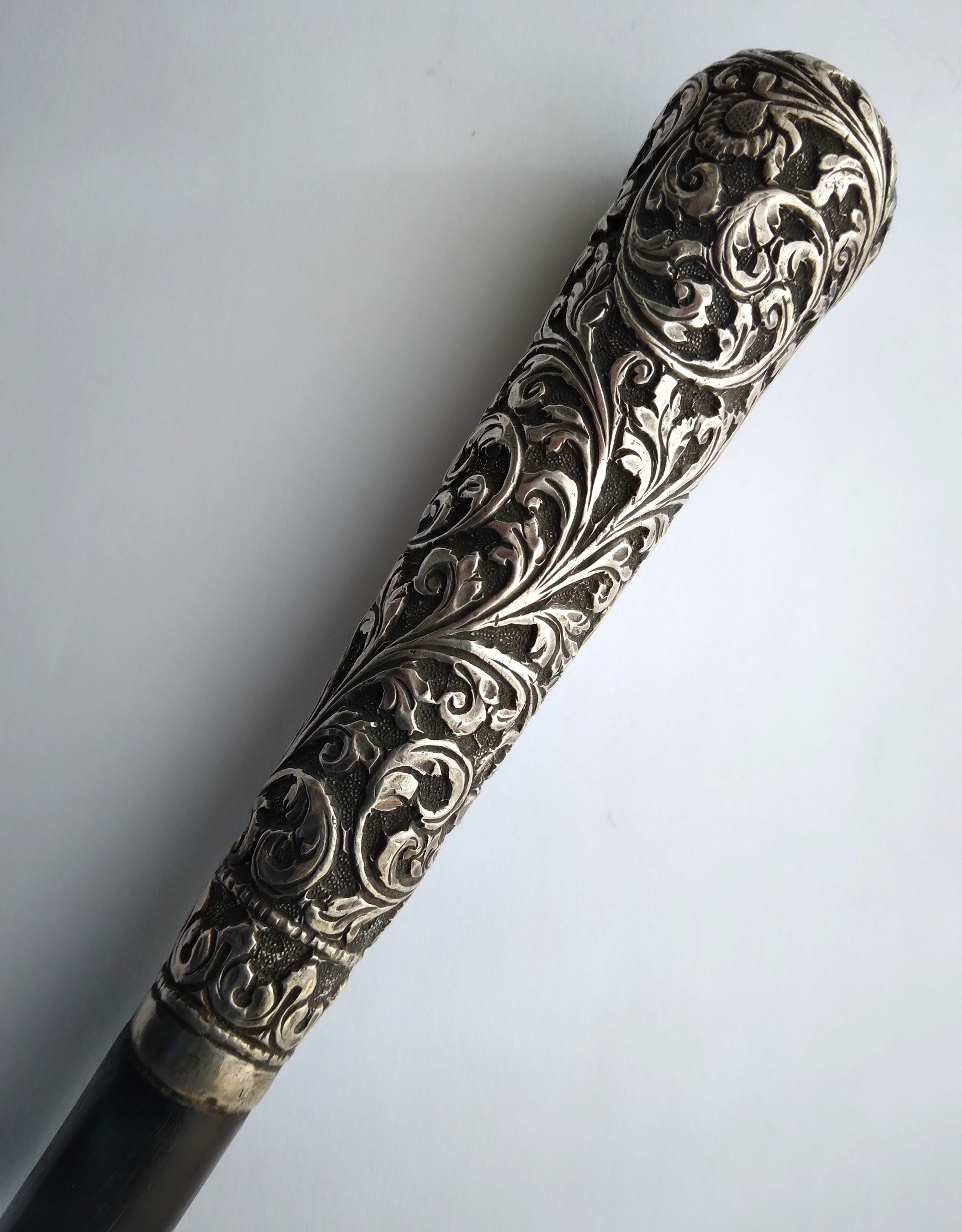 Walking cane with Indian silver handle.