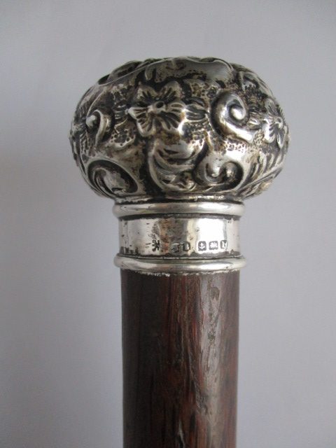 Silver top palm wood walking cane