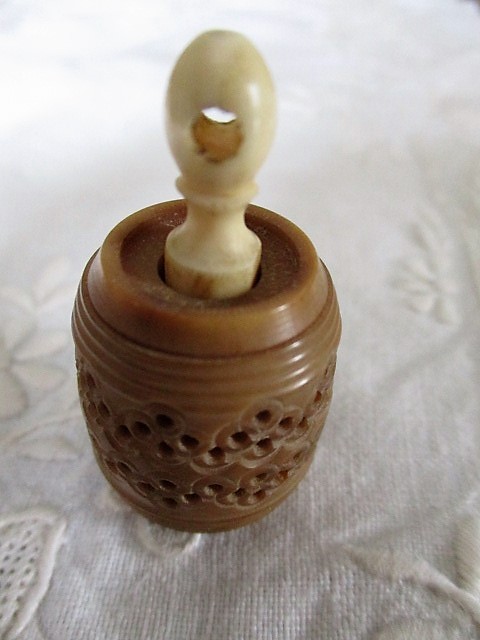 Pierced tagua nut tape measure - Rod Naylors Antique Restoration