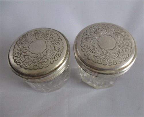 A pair of vanity box bottles